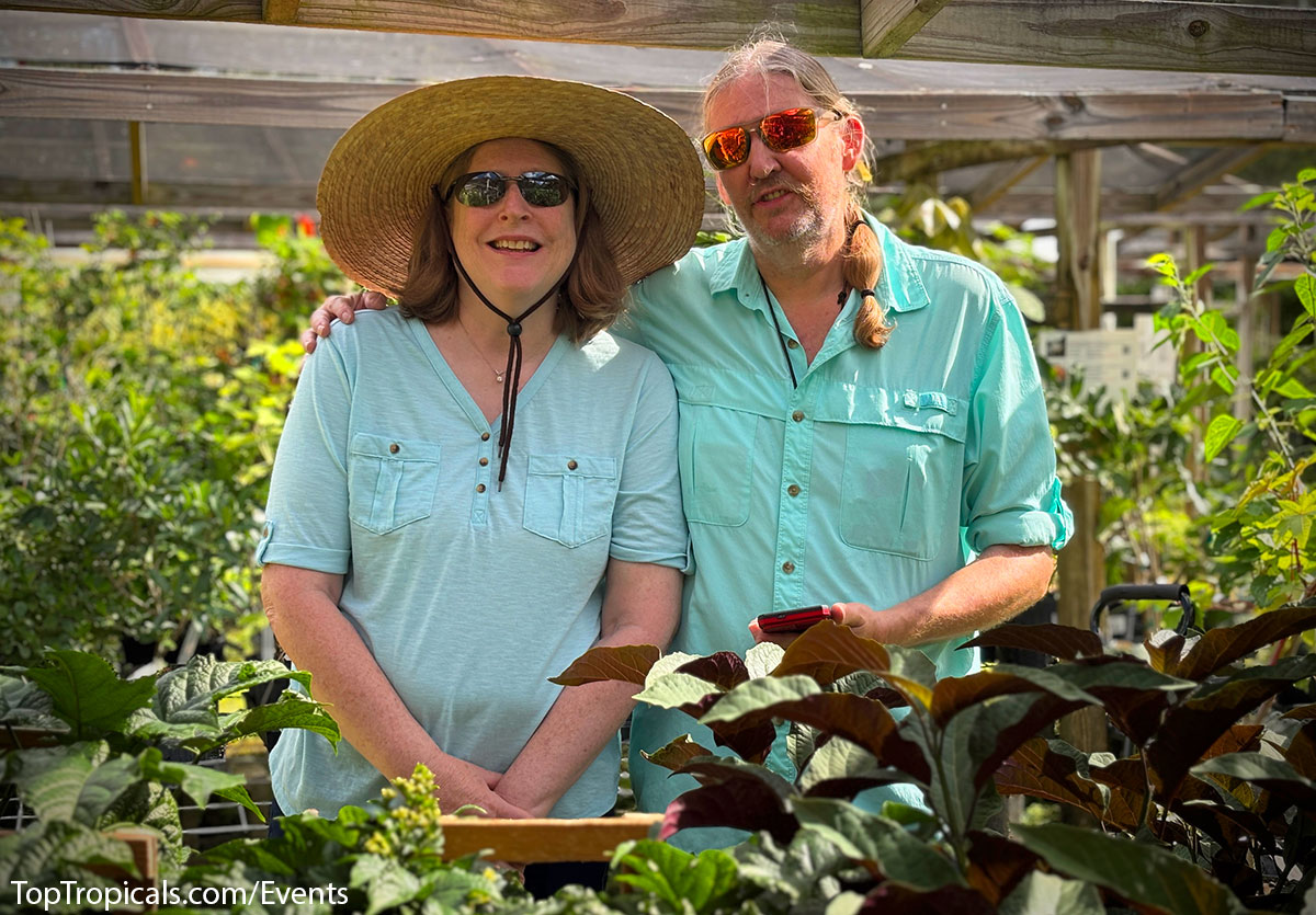 Visitors in front of plants at Top Tropicals Fathers Day Plant Market