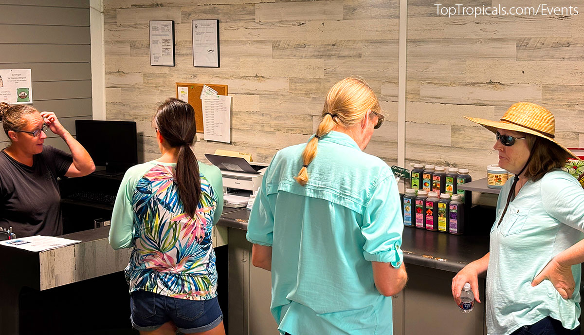 Customers inside office at Top Tropicals Fathers Day Plant Market